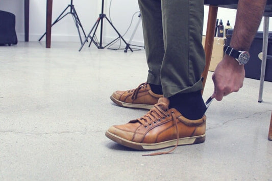 How to Use a Shoe Horn to Make Sliding on Snug Shoes Simple