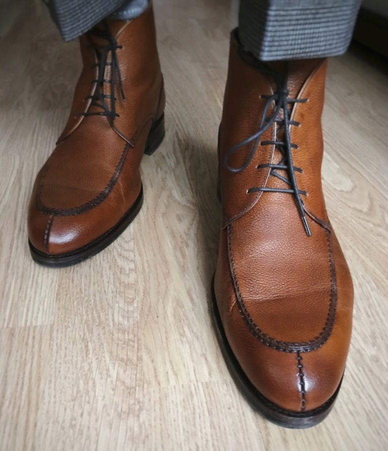 Dress shoes developed a sticky residue along the whole edge on